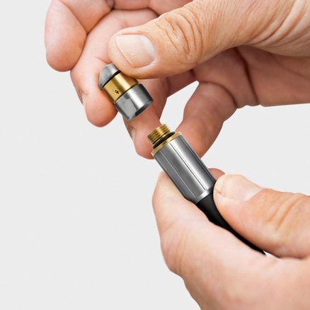 Practical changing system with two different nozzles